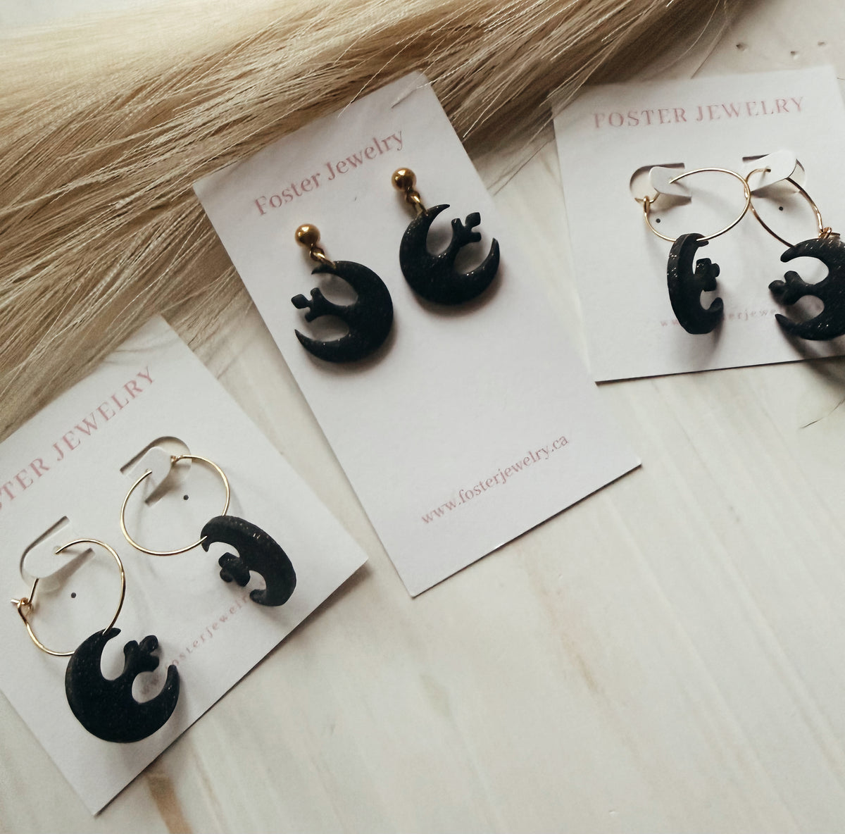 SW symbol earrings