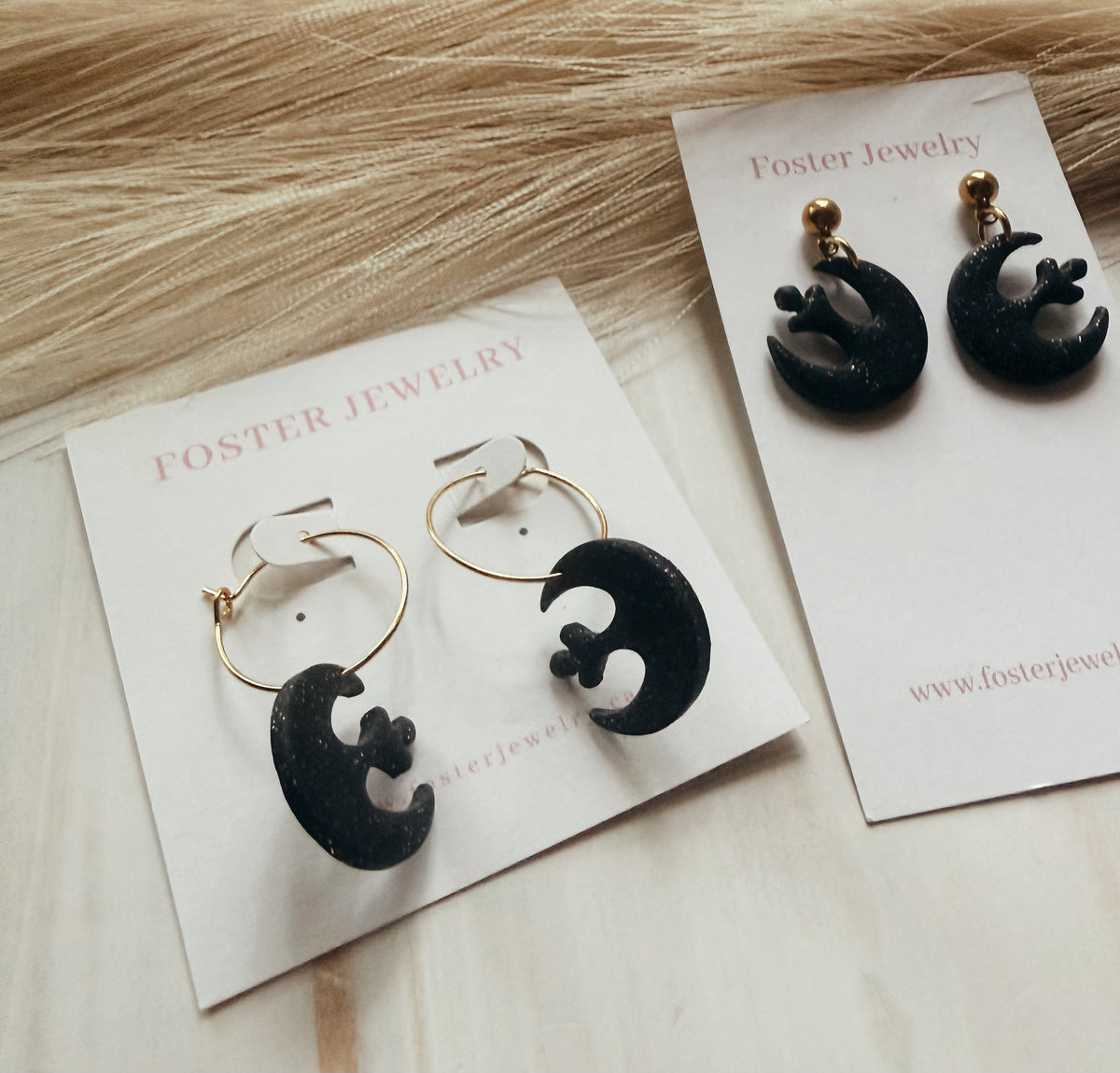 SW symbol earrings