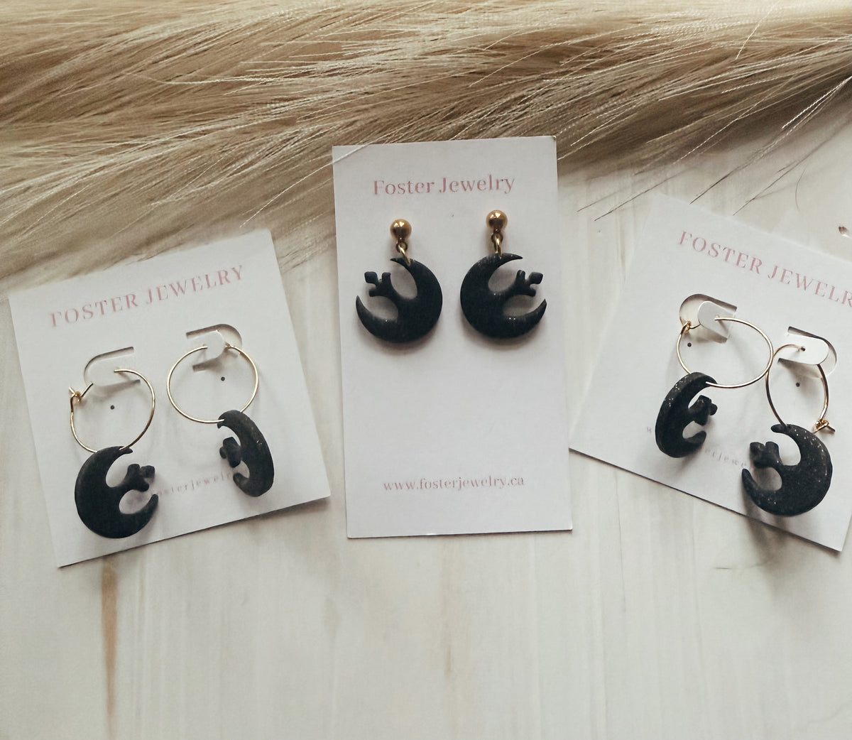 SW symbol earrings