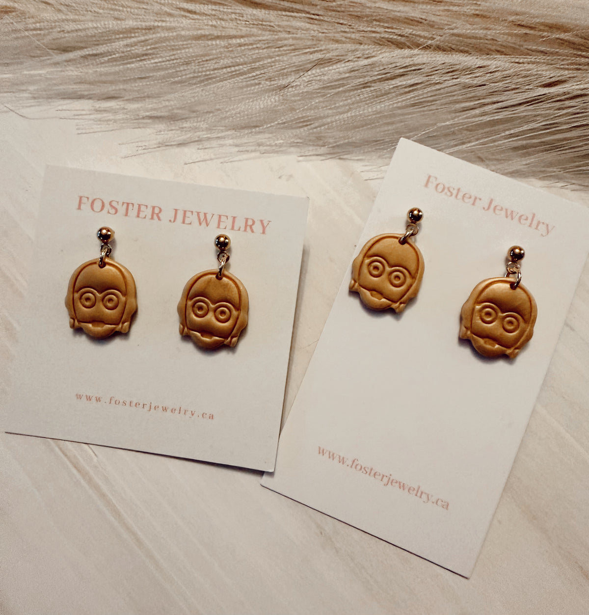 Gold droid earrings