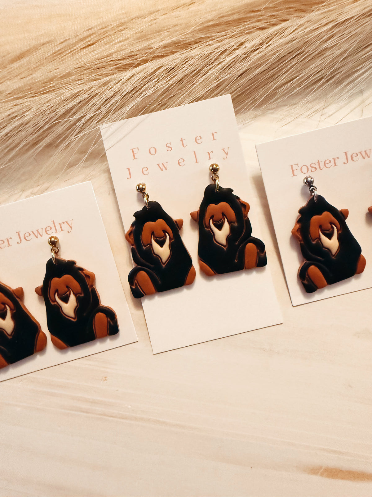 Evil lion earrings