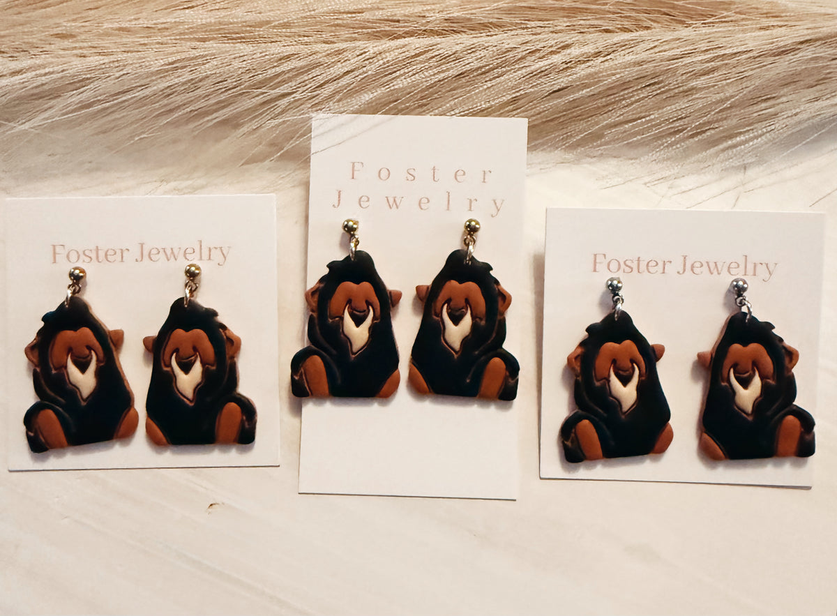 Evil lion earrings