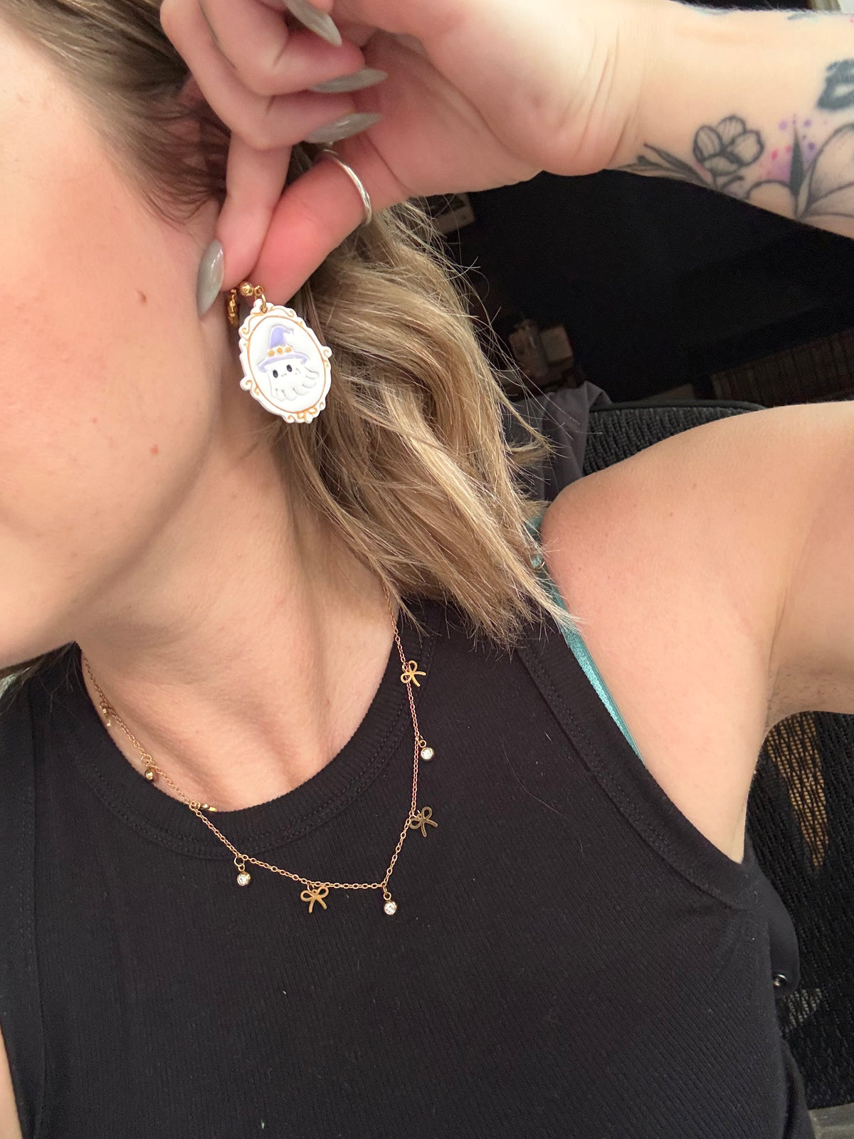 Ghost bow frame earrings