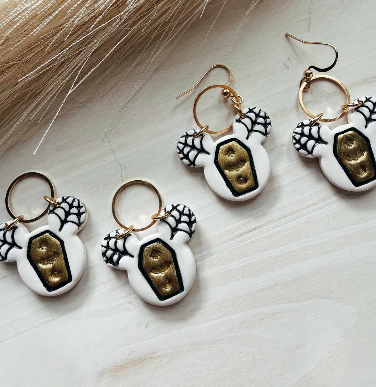 Mouse web coffin earring