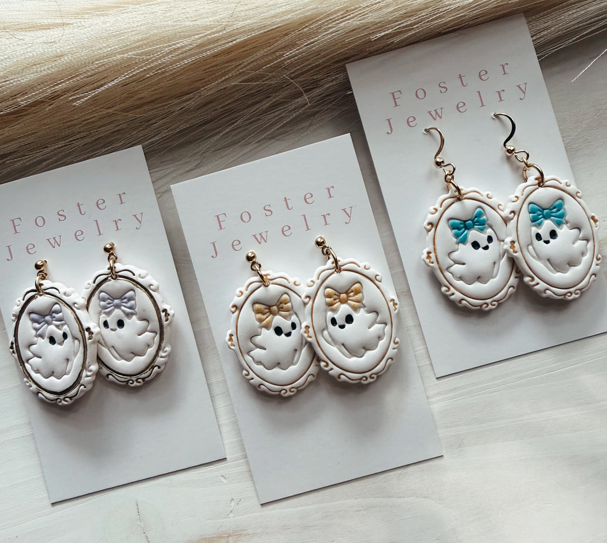Ghost bow frame earrings